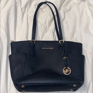 Jet set tote shoulder bag